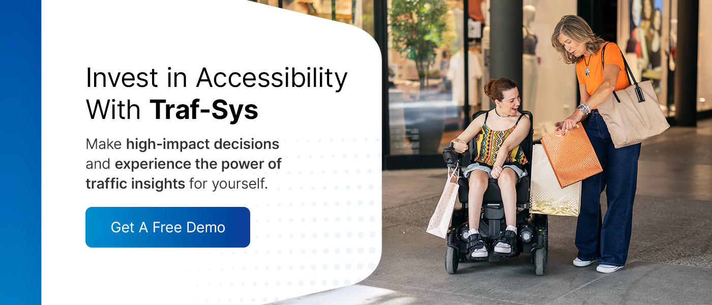 woman in wheelchair shopping with friend at retail store