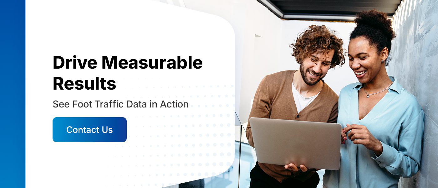 two people looking at results data on a laptop